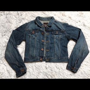 child’s distressed jean jacket.